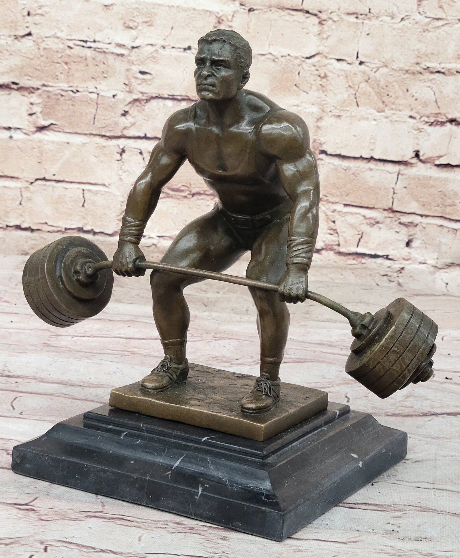 Power Weightlifters Sport Memorabilia Bronze Figure: Weightlifters everywhere will appreciate the detail of this amazing piece. His musculature, vascularity, gear, and expression are all superb. This would make a tremendous trophy at your next
