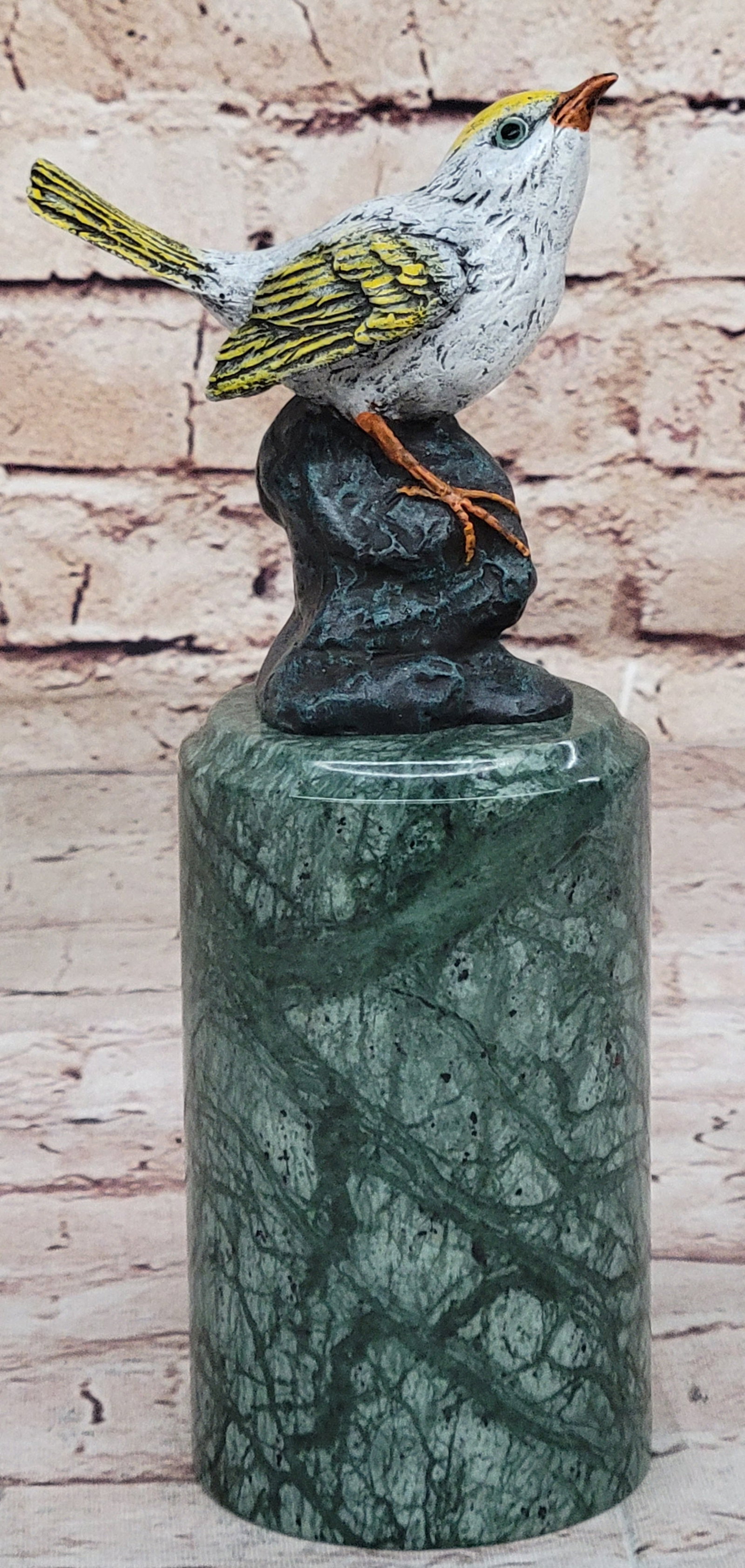 Love Birds Bronze Sculpture: Birds of paradise. Perched on a marble base, the breathtaking multi-color Finches figurines are a testament to natural beauty, featuring wings of vibrantly colored real bronze. It may even be a sweet