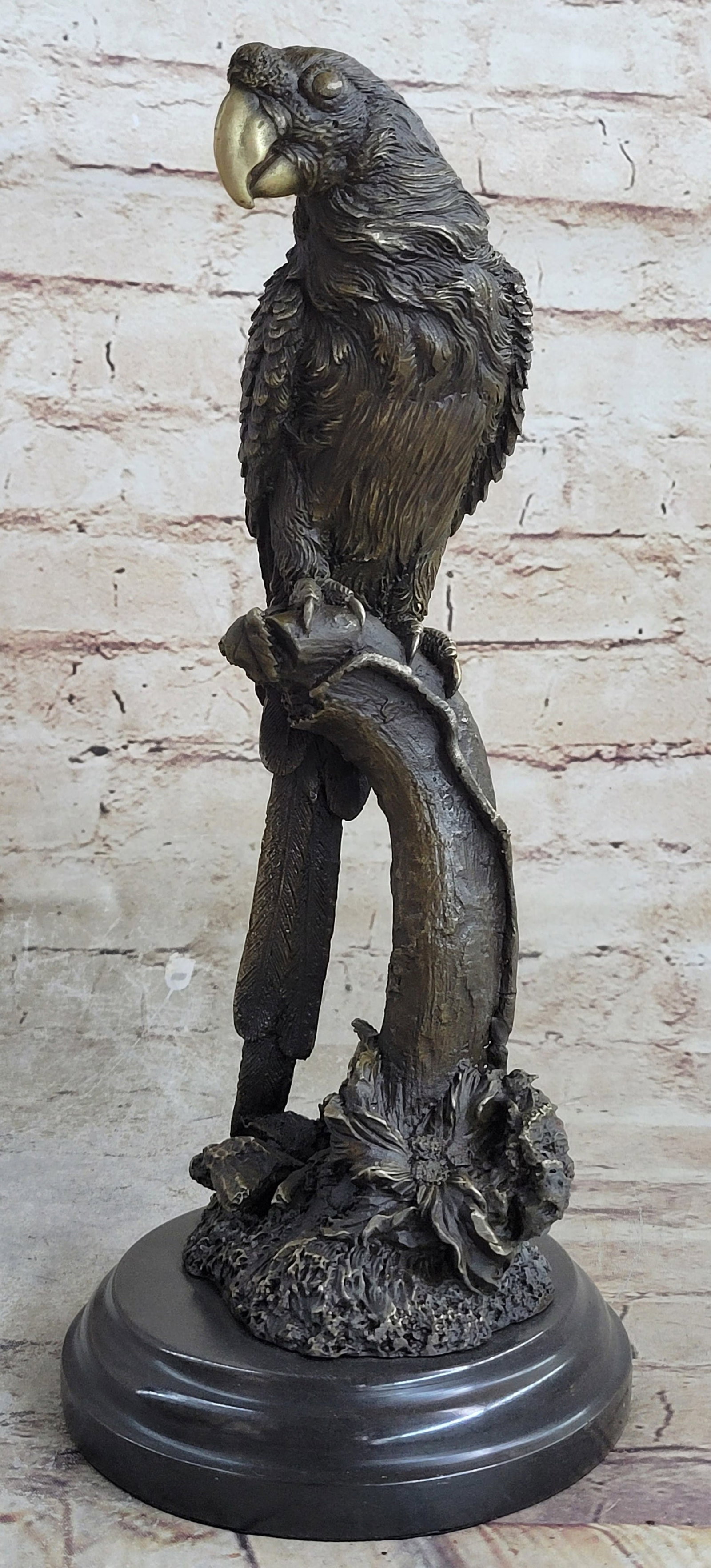 Parrot Bronze Sculpture: This beautiful Brazilian parrot is unique for all you bird lovers. Some birds, especially corvids and parrots, are among the most intelligent animal species. He is sitting up on top of a tree trunk,