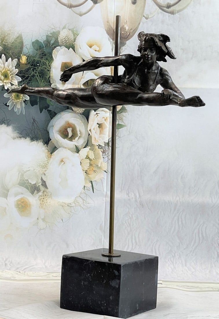 Gymnast Olympic Memorabilia Bronze Sculpture: This woman is a talented Gymnast demonstrating her agility and flexibility. Balancing on a pole as she has trying to amuse you. Her muscular legs curve backward and rest her hands on her shoulders.