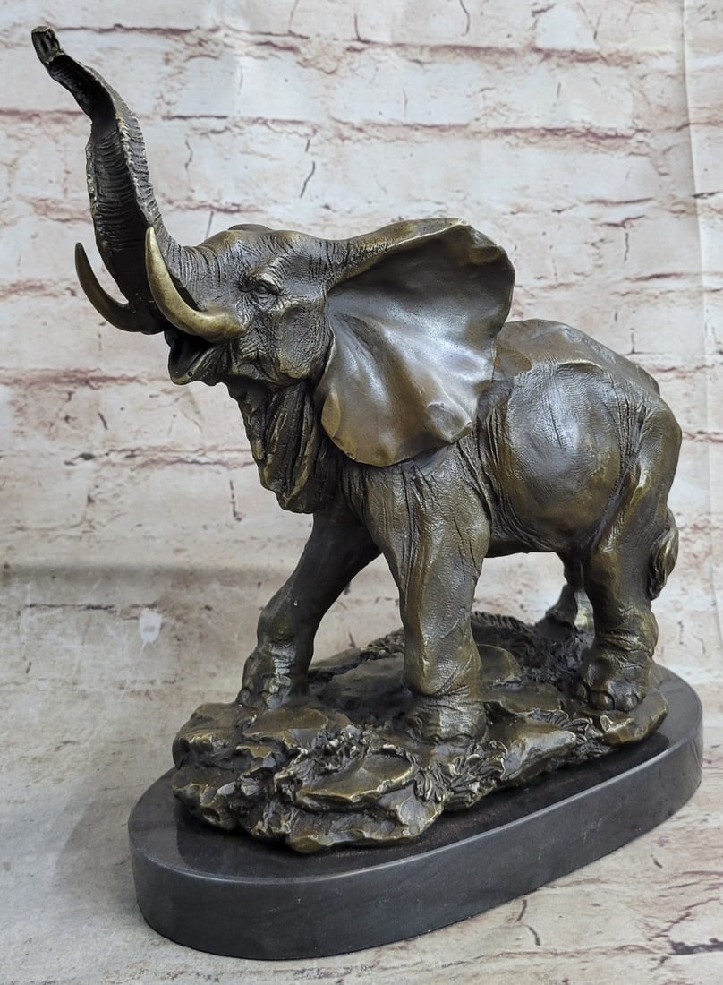 Elephant Symbol of Luck Bronze Sculpture: This sculpture brings out the beauty of the elephant, focusing on the parts that make it unique. If you turn it to face you, you will be greeted by a beautiful face. Its large clumsy flapping ears