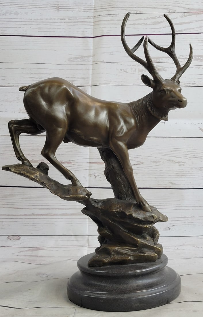 Elk Deer Stag Buck Wildlife Edition Bronze Statue: This bronze sculpture was cast using the age-old method of lost-wax casting and stained with a brown patina finish for perpetuation and is mounted upon a marble base. Bronze Dimensions with Marble