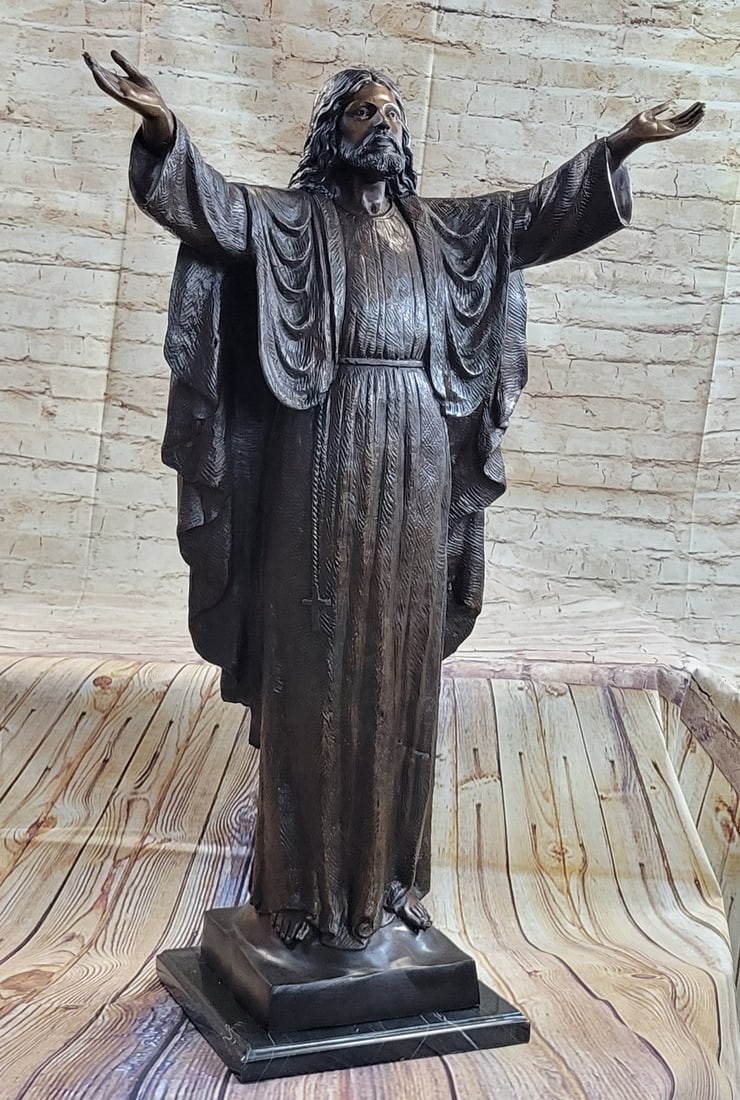 Jesus Church Israel Bronze Sculpture: He lifts his arms up to the lord and welcomes his fellow followers and newcomers. He is Jesus Christ and lifts his arms with his palms up towards the heavens and lifts his heart up to the lord. He is 