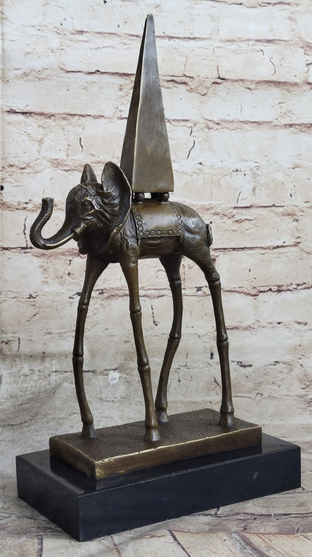 Space Elephant Bronze Sculpture: This bronze sculpture was crafted using the lost wax method. Dimensions: Height 13 X Width 7 inches.?Weight: 7 LBS.