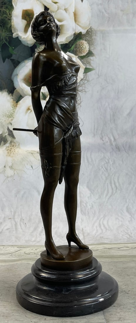 The Riding Crop an Impressive Brown patina Bronze Sculpture: Girl with Riding Crop is a noble home accessory for erotic art lovers. The viewer of the lascivious bronze figure becomes a passive voyeur. Confident and without any sense of shame the young lady pres
