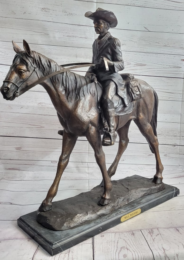 Season Cowboy Bronze Sculpture: A seasoned cowboy courageously rides his wild horse. He is bucked by his uncontrollable stallion but his grip on the reins never break. His body rolls with every move of the horse. He is dressed in a