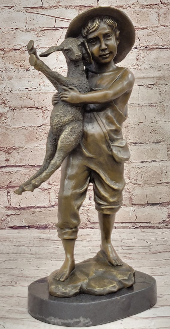 Young Farm Boy Bronze Sculpture: It features a cute little boy in overalls holding a little cute lamb. This is a beautiful and highly collectible figurine. This would be a lovely addition to any collection, this charming little boy w