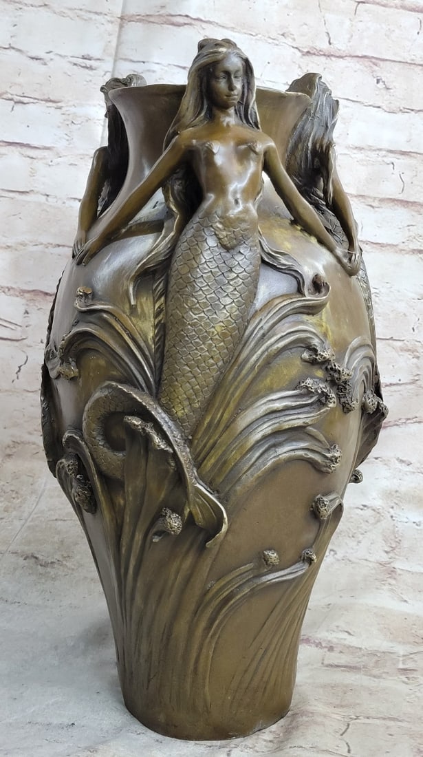 Three Beautiful Mermaids Flower Vase Bronze Sculpture: This beautiful art nouveau vase shows three beautiful Mermaids holding hands accompanied by a bundle of flowers and vines. This vase severs as a multipurpose. This Bronze vase was cast using the Lost 