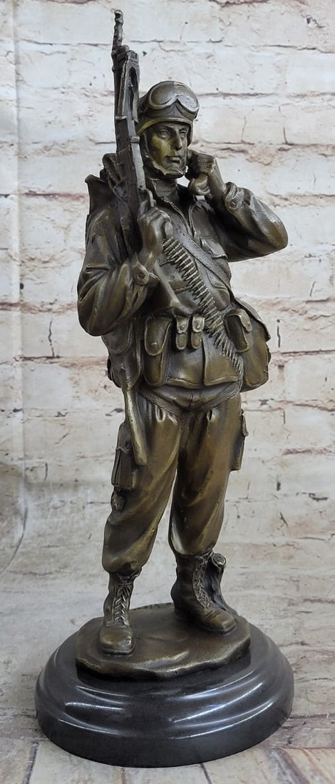 American Soldier Bronze Sculpture: This Sculpture of a soldier is amazing. The details of the soldier clothes are delightful and astonishing. To see how this artist took his time to add every single detail, like the pouch, the rifle, a