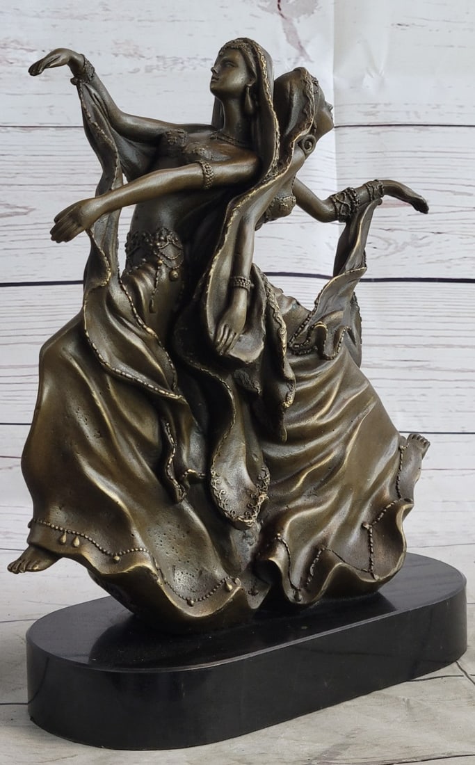 Twin Dancer Bronze Sculpture: This bronze sculpture of the female twins stands for the Gemini zodiac dual sign. Geminians are curious, versatile, talkative with mental alacrity but being a dual sign has both an up and a