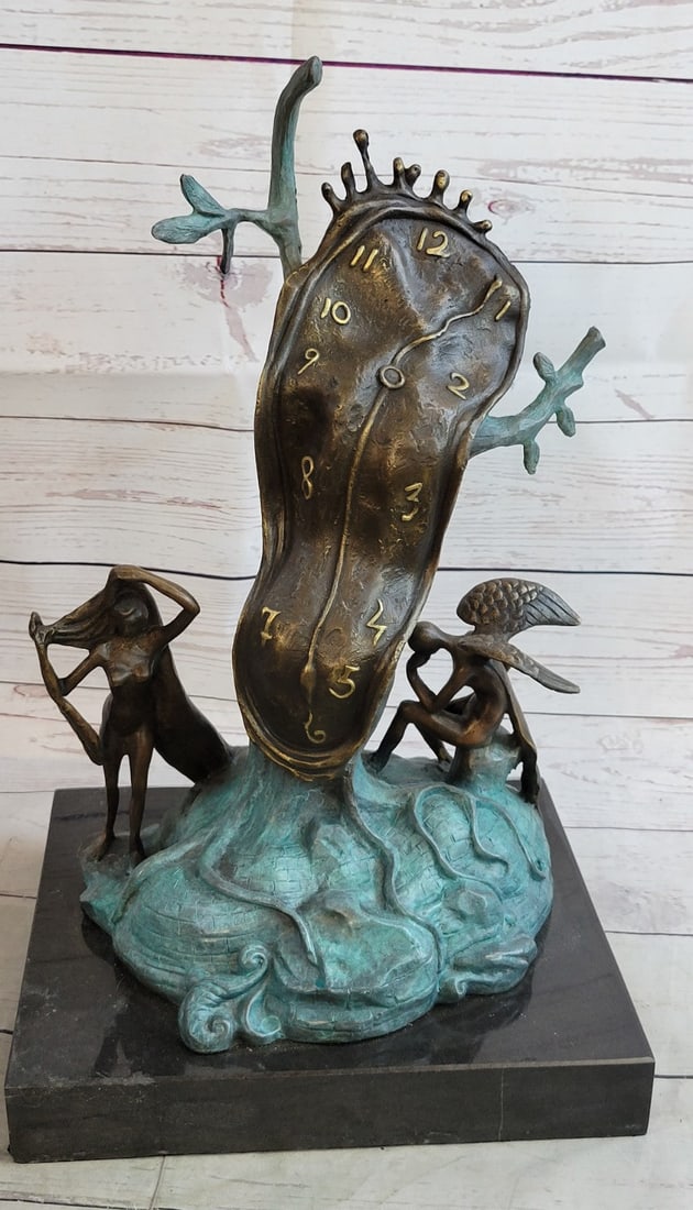Nobility of Time Melting Clock Bronze Sculpture: The stunning five meter high sculpture has been placed in the city\'92s most prestigious and historic square, in the towns oldest quarter which dates from the twelfth century. The soft melting watch