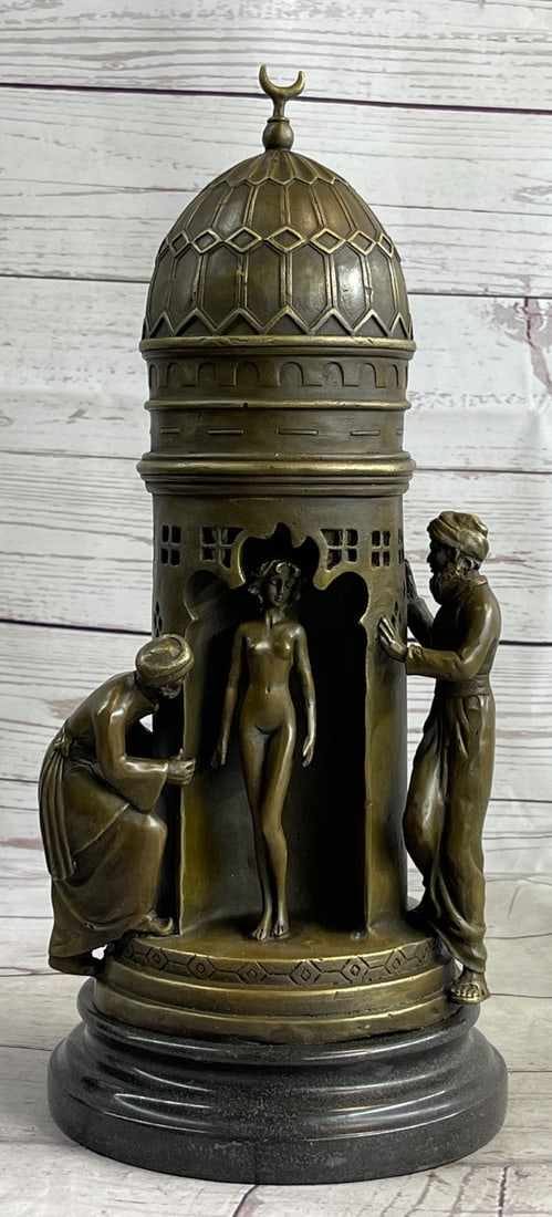 Harem Arab Men Nude Female Bronze Sculpture: This bronze shows an oriental bathhouse with a cupola on the roof of which is a half-moon. At the entrance to the bathing place, two Arab men and try a look inside the building to see a gorgeous nude