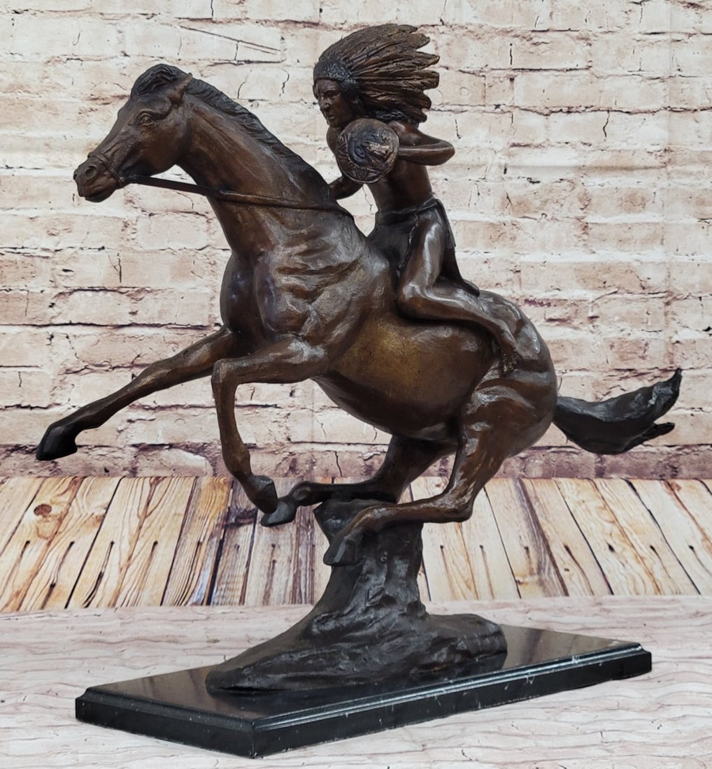 Warrior Bronze Sculpture: This is a very interesting Sculpture of a Native American chief. He sits on his trusted horse and wanders the land, holding a spear and prepared for any potential threats. He has triumphed over many d