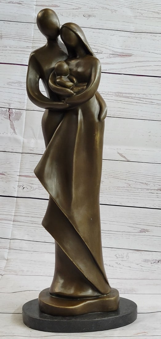 Young Couple With Newborn Baby Bronze Sculpture: This Bronze Sculpture honors the union of marriage between men and women celebrating their love for a lifetime. Within their embrace, sleeps their newborn child, a creation out of their old love. The 