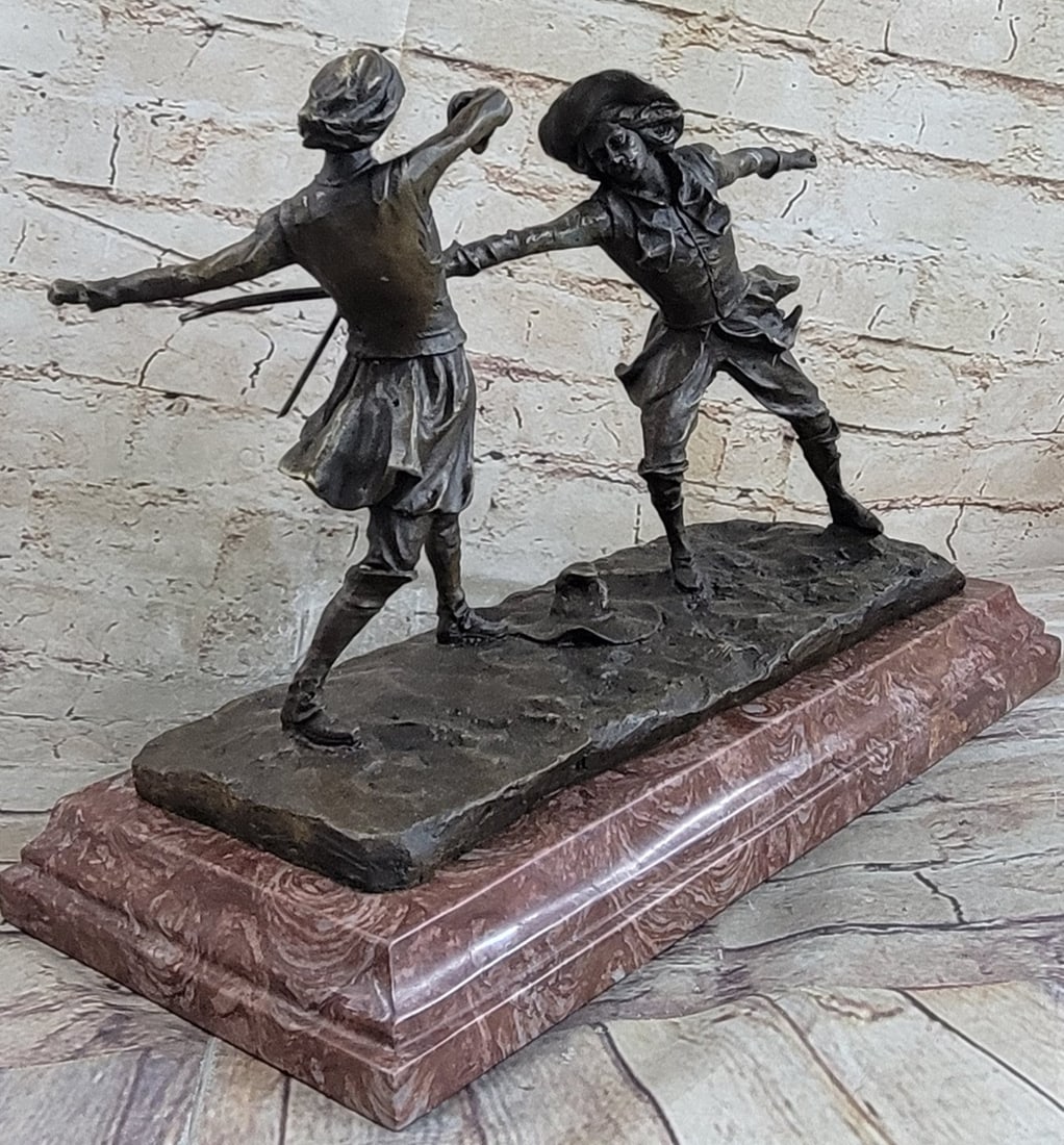 Two Male Fencer Bronze Sculpture: Perhaps a Bronze Male pair entitled Femmes Fatales here are two men fencing. Foils engaged in sporting combat, these cavaliers have at it. The action appears to lunge right at you at every angle. Dime