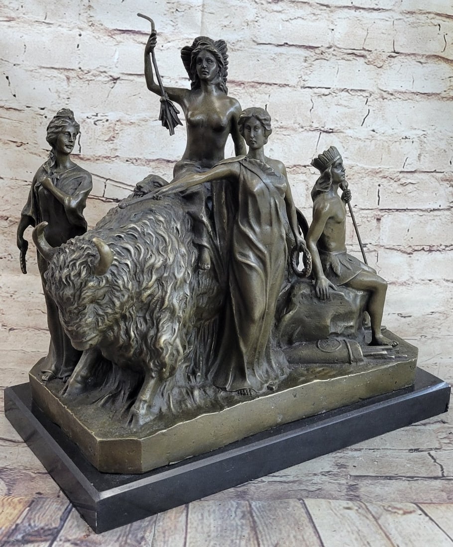 Four Nude Woman Surrounding King Bronze Sculpture: Four women surround the great American bison. The Native American woman is all dressed in varying outfits from half nude to a long cloth dress. One woman sits astride the large buffalo with a long wea