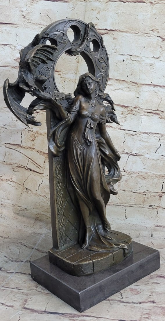 Mythical Dragon and Woman Bronze Sculpture: This sculpture is unbelievable in details. This astonishing woman stands on her toe, as a big dragon stand in back of her. She has the most amazing and sexy body for a female. The Dragon is very