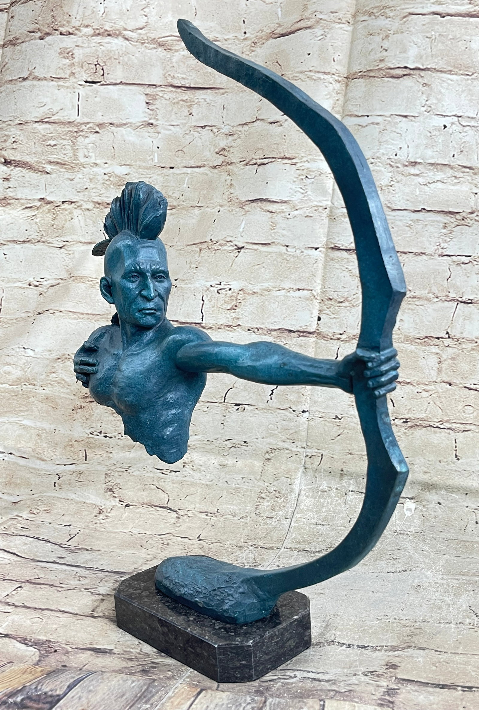 Indian Warrior Bronze Sculpture: The bronze sculptures unique composition seems as if the entirety of the body is slowly being taken, particle by particle, like dust in the wind. The beholder sees the final stages of this creative er