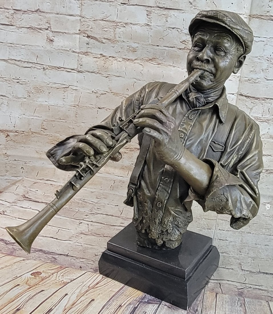 Black African Clarinet Player Bronze Sculpture: This figurine is a great way to show your love for music off in your home. Great gift for anyone with a passion as strong as yours. A handsome Bronze Statue of a Black Musician playing the clarinet, s