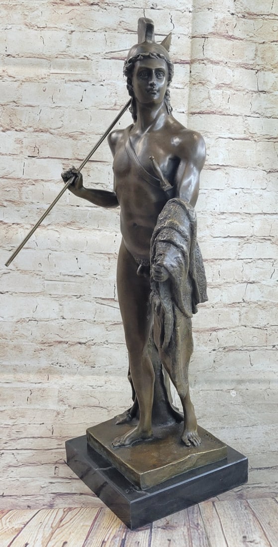 Jason with The Golden Fleece Bronze Sculpture: The Roman legion soldier boldly stands nude except for some regalia. On the top of his head, he wears a galea, which is a soldier?s helmet. A baldric strap across his chest is a leather belt