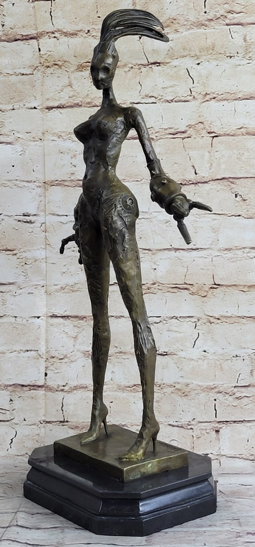 Erotic Sensual Walking Nude Female Bronze Sculpture: The abstract art piece is can hold many interpretations and emotions in its observers. The wiry and almost metallic appearance piece resembles a woman standing. The motives and feelings of the