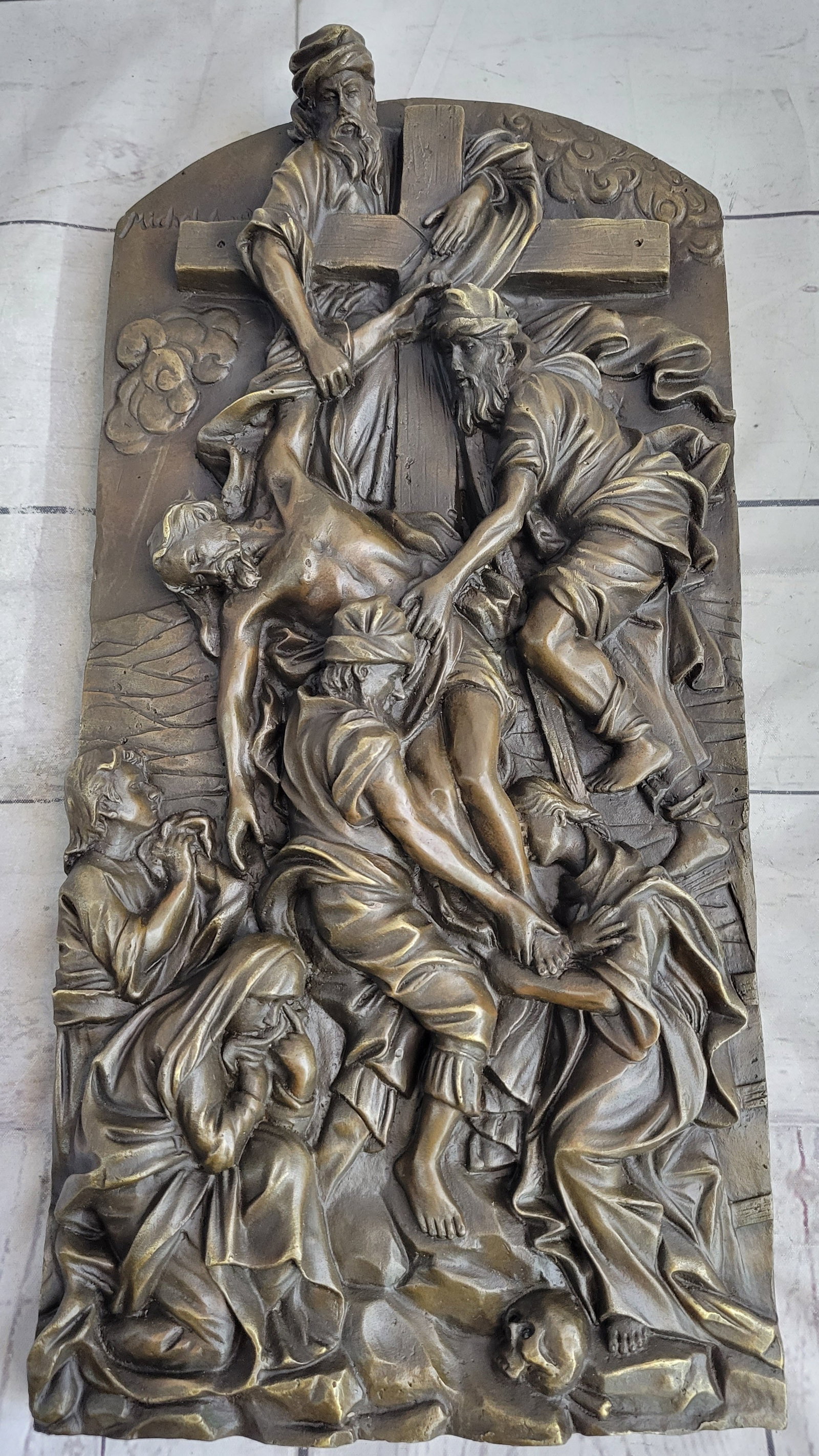 Wall Relief Religious Jesus Bronze Figurine: An awe-inspiring Sculpture of The Descent from the Cross is also known as The Deposition of Christ. Joseph of Arithmetic and Nicodemus, as well as other followers of Christ, remove Jesus' body from