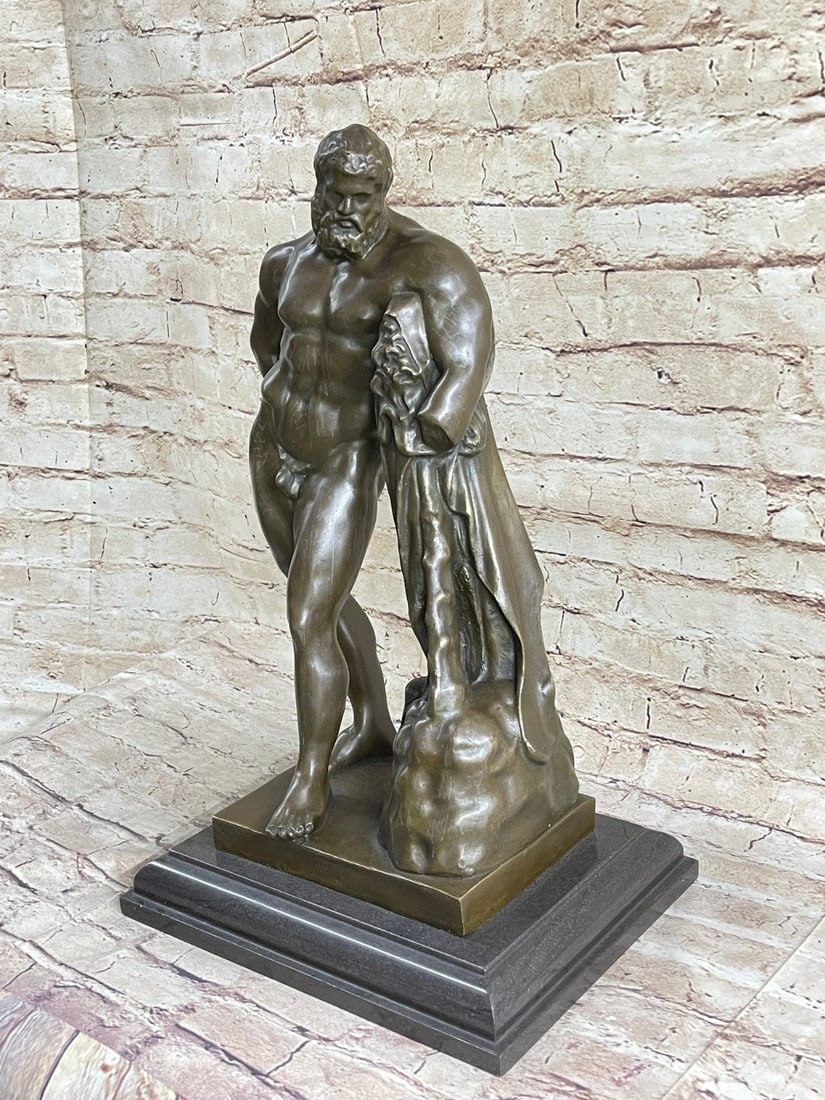 Hercules Greek Myth Nude on Marble Base Bronze Sculpture: This burly man stands nude. His profound muscles are evident in every part of his body. Although his body is physically perfect, the man has suffered an injury that holds his gaze. The men arm is