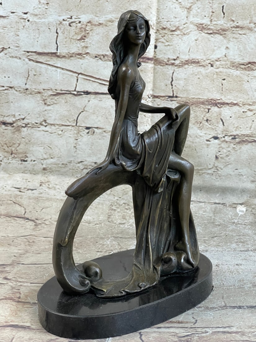 Hot Cast Nude Girl Bronze Sculpture: This pose of a peaceful girl sitting with downcast eyes captures the true rebirth of the innocence age. Sitting on a marble base. This bronze sculpture was crafted using the lost wax method and