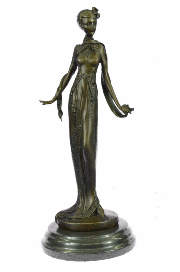 Art Nouveau Fashion Model Bronze Sculpture: The Young Lady Gazes Into sky. She Is Dressed In A Simple Long Gown That Clings To Her Figure. She Clutches The Fabric With Her Other Hand So It Raises A Little From The Hold. This Beautiful
