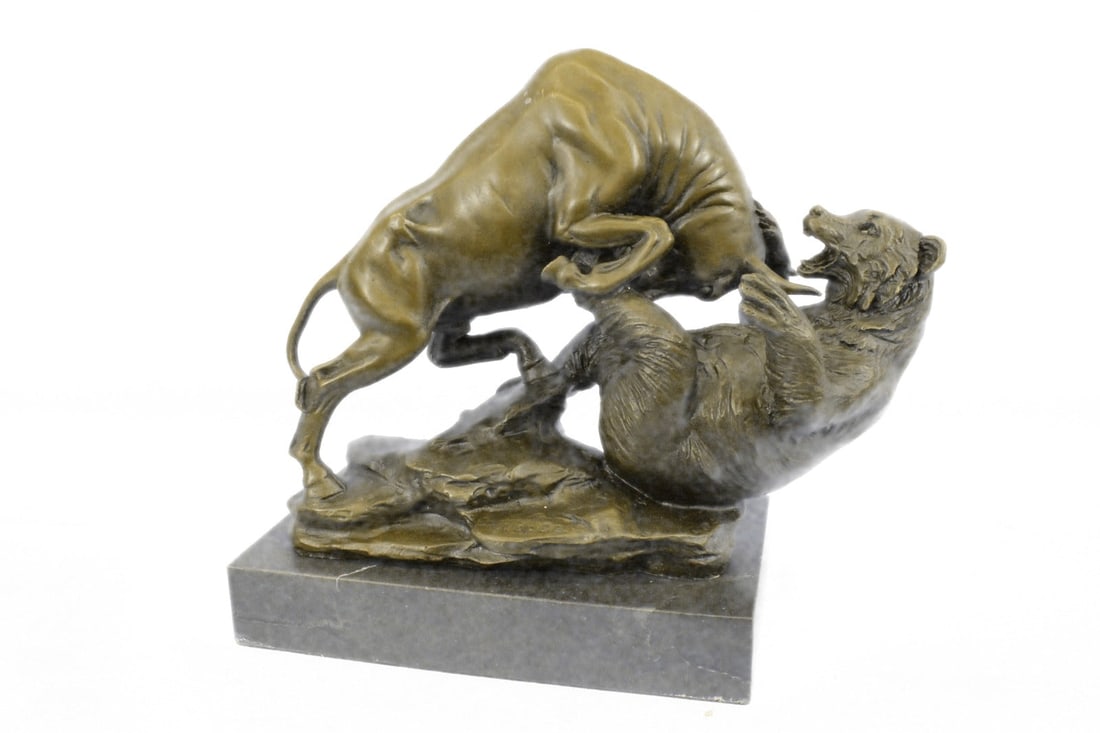 Stock Market Bull Vs Bear Bronze Sculpture: A fierce battle has broken out between two known killers. The bull charges its horns in and the bear locks his massivepaws over its head, pulling him into his plump body. The bear snarlsand roars.
