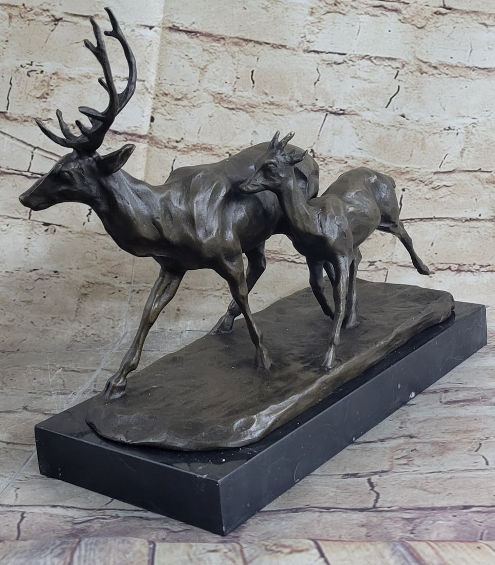 Animal Edition Bronze Sculpture: An absolutely beautiful bronze sculpture depicting a splendid Elk and sculpted. It is a beautiful example depicting the elk's majesty as it moves about the forest. It is elegantly mounted on a marble 