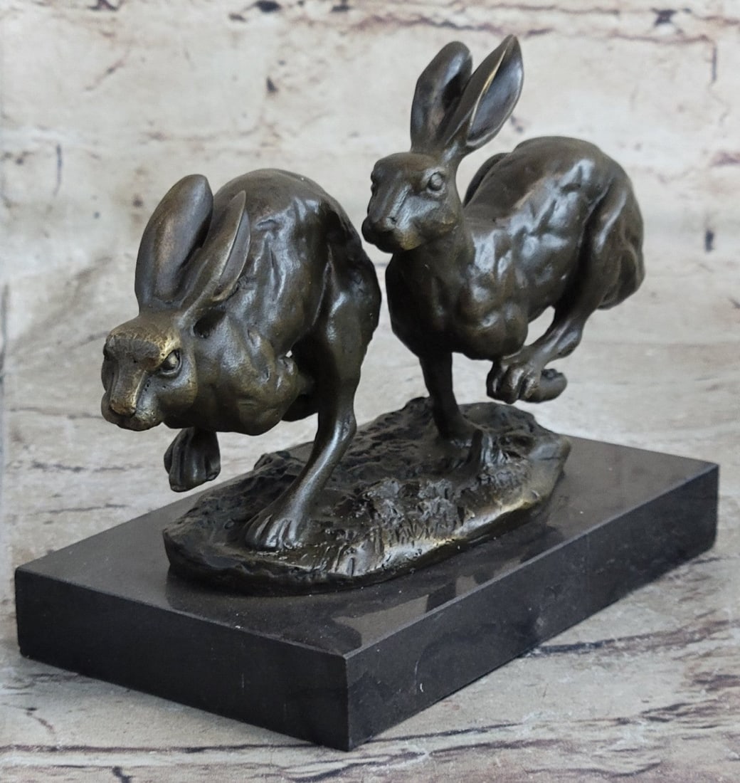 Two Eastern Jackrabbit Bronze Sculpture: The Bronze hare also is known as the brown hare, Eastern Jackrabbit and Eastern prairie hare are a species of hare native to northern, central, and western, and Europe and western Asia. It is a mammal