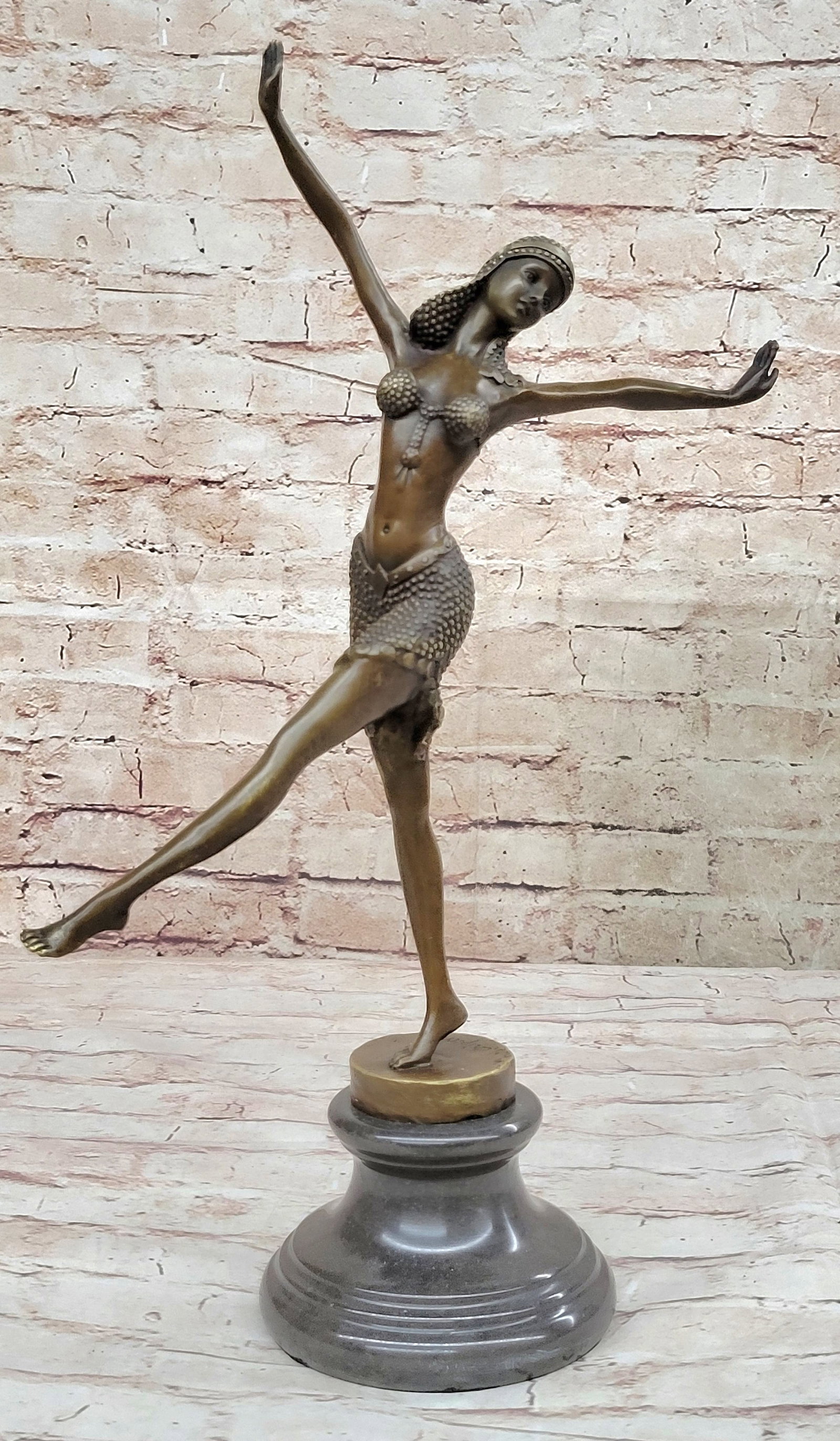 Free Floating Dancer Bronze Figurine: This Bronze Sculpture is created from expensive Bronze utilizing the lost wax method of casting Bronze Sculptures. Dimensions: Height 17 X Width 14 inches. Weight: 8 LBS.
