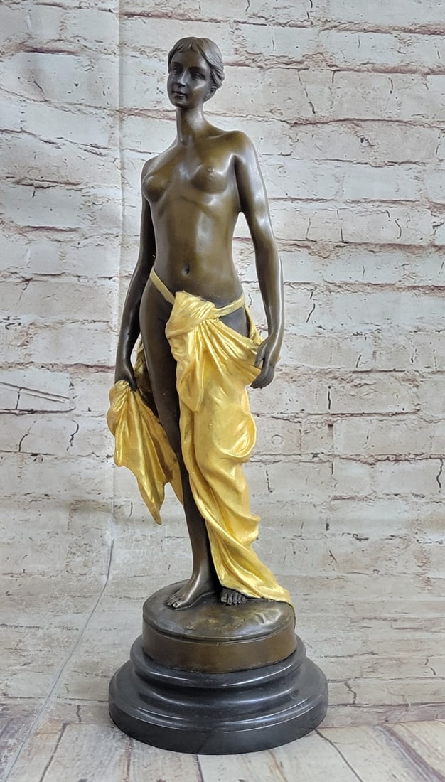Nude Girl Bronze Sculpture: She stands semi-nude with a nonchalant expression if daring you to turn away.?Was exhibited in 1893 at the world's Columbian Exposition in Chicago, in a north court of the central pavilion in the art 