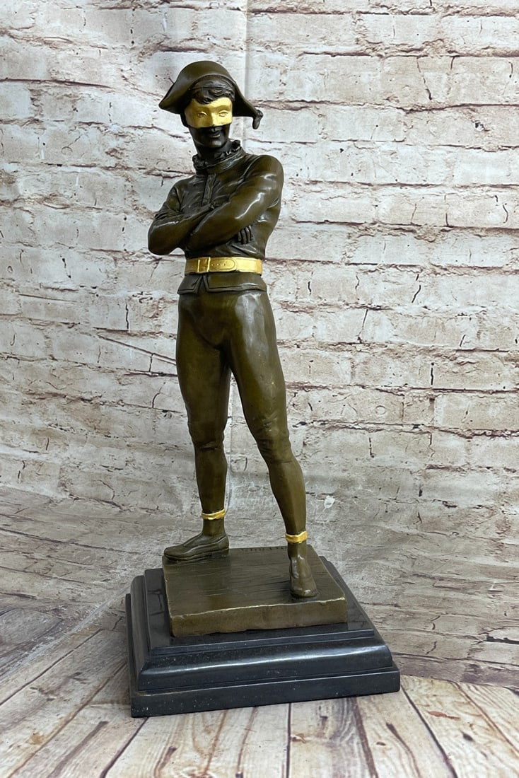 Zorro Bandit with Mask Gilt Bronze Sculpture: Rene de Saint-Marceaux (Charles Rene Marceaux, French, 1845 to 1915) bronze Harlequin figure, the figure modeled standing with arms crossed, and mounted atop marble base-rich brown palliation. Dimensi