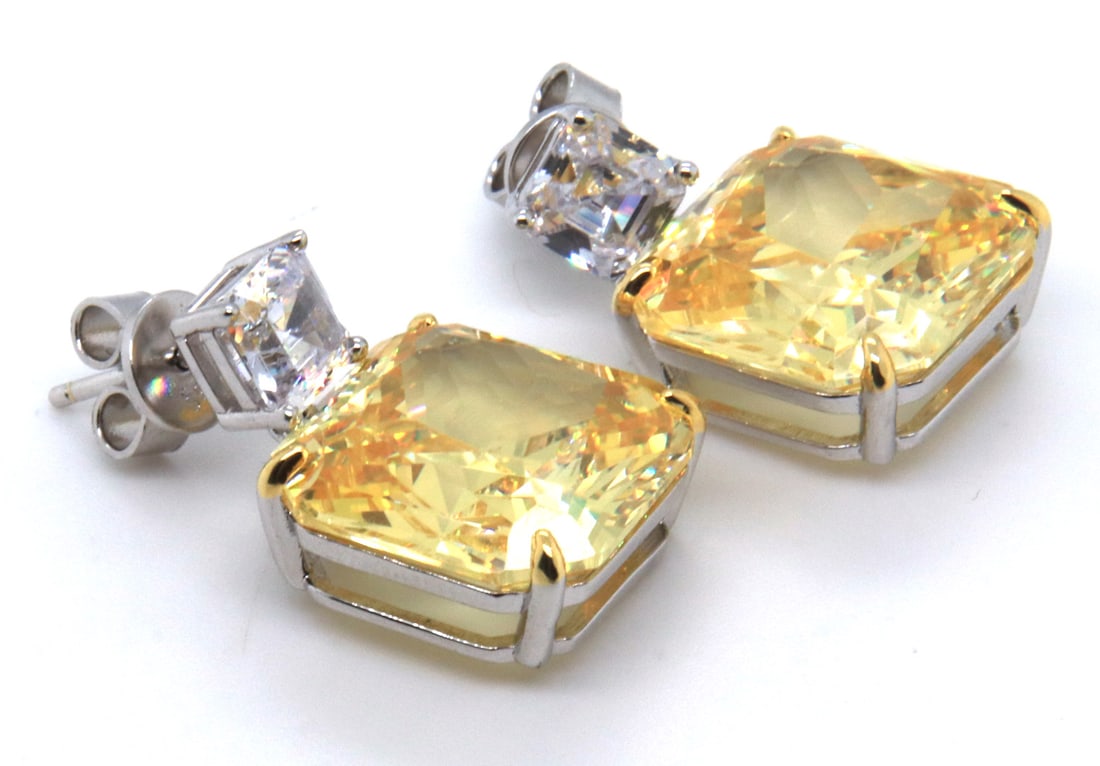 Sterling Silver Yellow and White Cubic Zirconia Earrings: 925 Sterling Silver Yellow and White Cubic Zirconia Earrings. Total weight of Earrings 16.20 Grams.