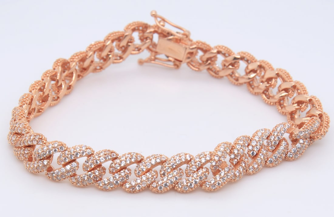 925 Sterling Silver Cubic Zirconia Curb Link Bracelet: 925 Sterling Silver Cubic Zirconia 7 inches Curb Link Bracelet. Total weight of Bracelet 17.40 Grams.