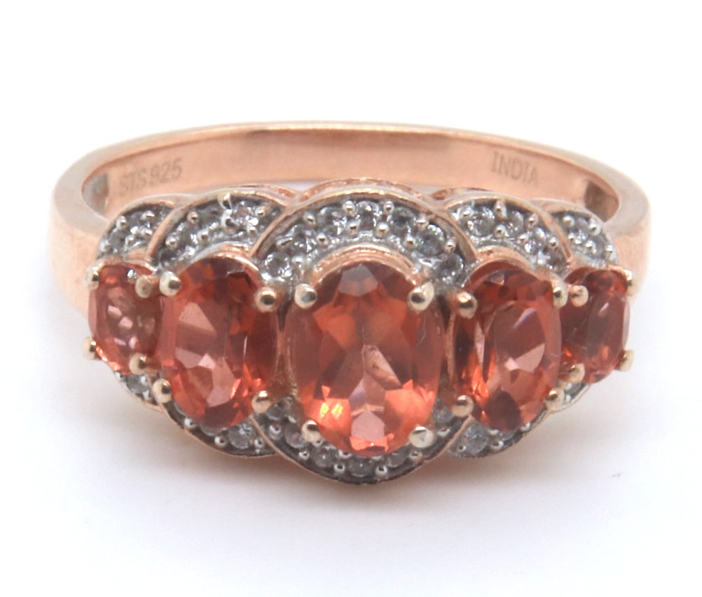 Sterling Silver Orange Cubic Zirconia Ring: 925 Sterling Silver Orange Cubic Zirconia Ring. Total weight of Ring 5.75 Grams. Ring Size 10.5"