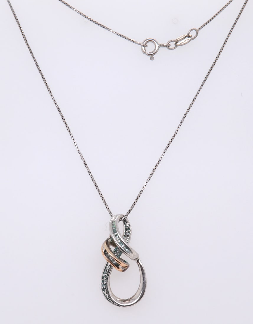 Sterling Silver Cubic Zirconia Pendant on Chain Necklace: Vintage 925 Sterling Silver Cubic Zirconia Pendant on 18 inches Box Chain Necklace. Total weight of Necklace 4.64 Grams.