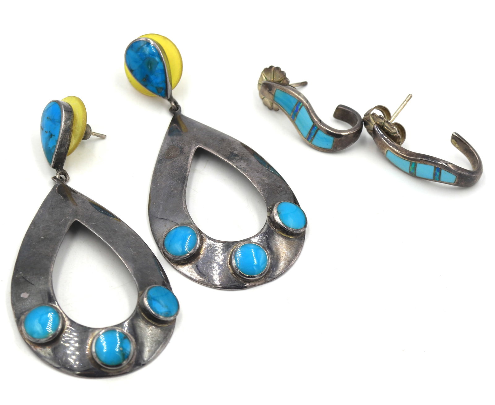 2 Pairs of 925 sterling silver turquoise earrings: 2 Pairs of 925 sterling silver turquoise earrings. Total weight of lot is 20.2 grams.