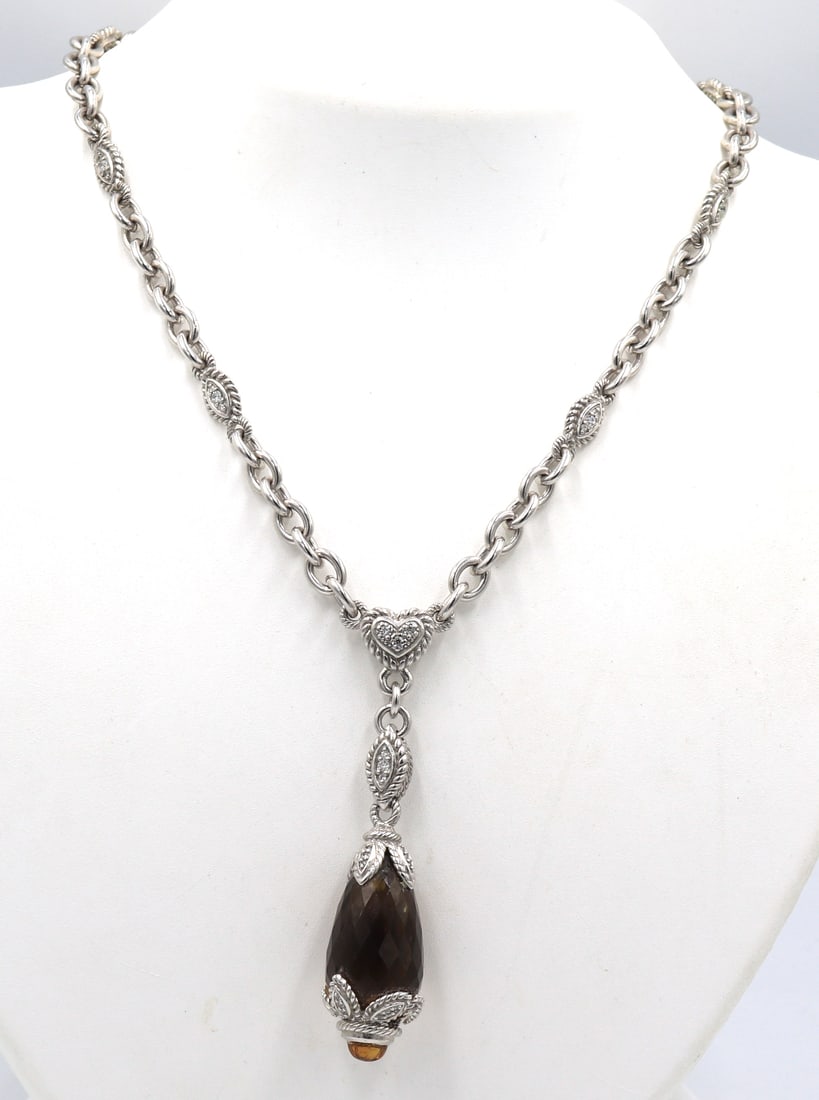 Judith Ripka smokey quartz pendant on chain: Judith Ripka smokey quartz pendant on 19 inches chain necklace in 925 sterling silver. Total weight of necklace is 50.4 grams.