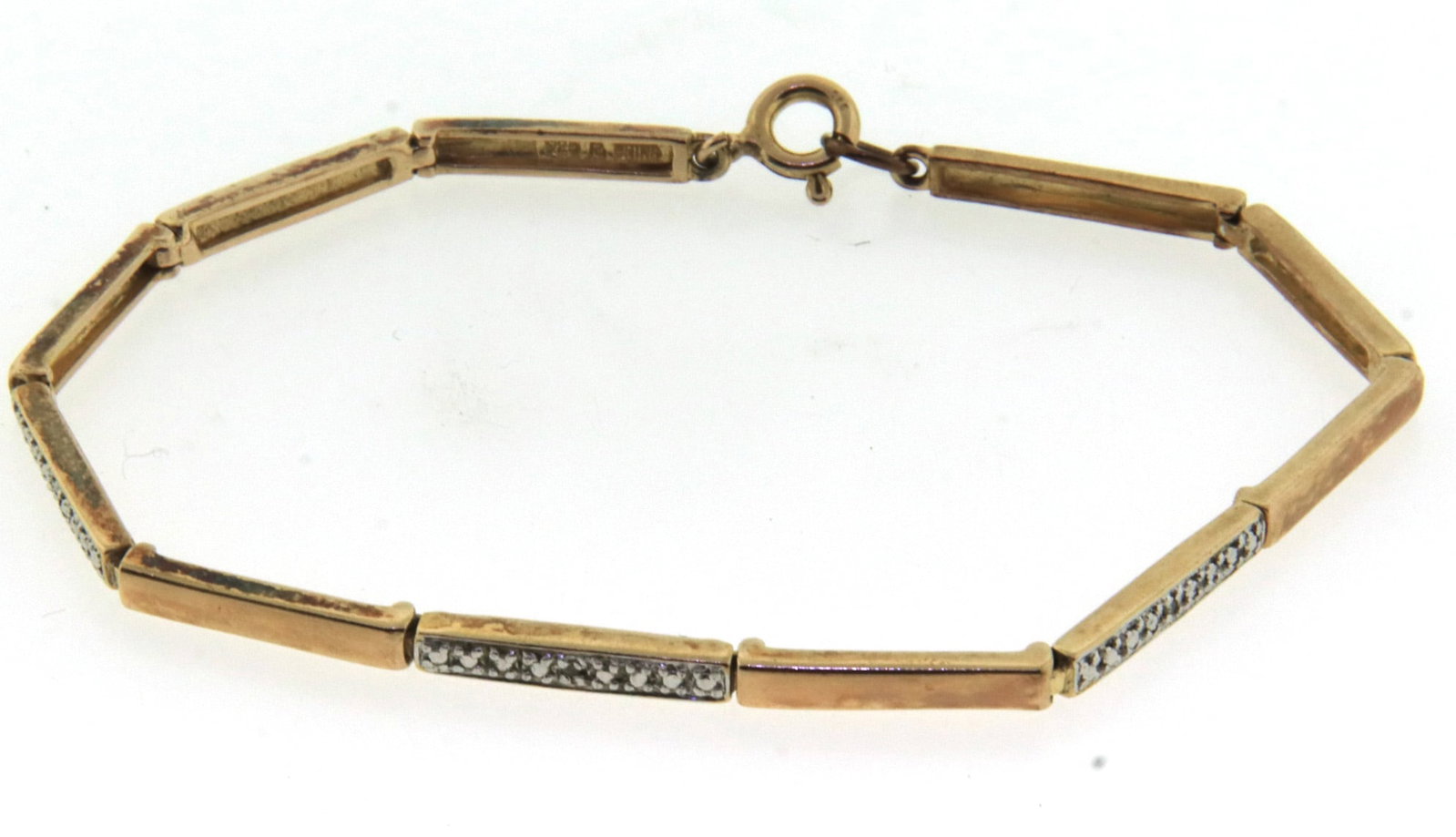 925 Sterling Silver Bracelet: 925 Sterling Silver cubic zirconia link bar 7-inch Bracelet. Total weight of bracelet is 8.5 Grams.