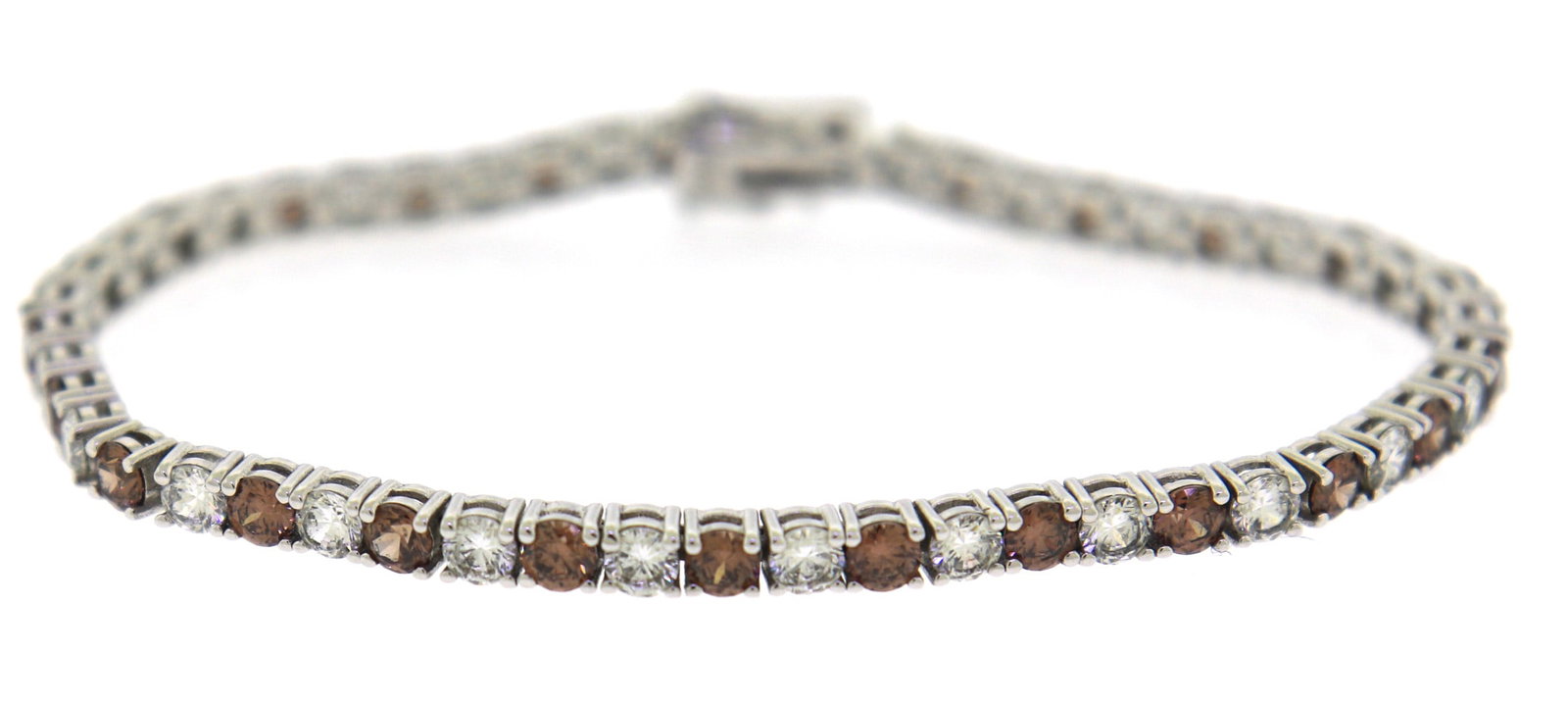 925 Sterling Silver Cubic Zirconia Tennis Bracelet: 925 Sterling Silver Cubic Zirconia 7" Tennis Bracelet. Total weight of Bracelet 13.59 Grams.