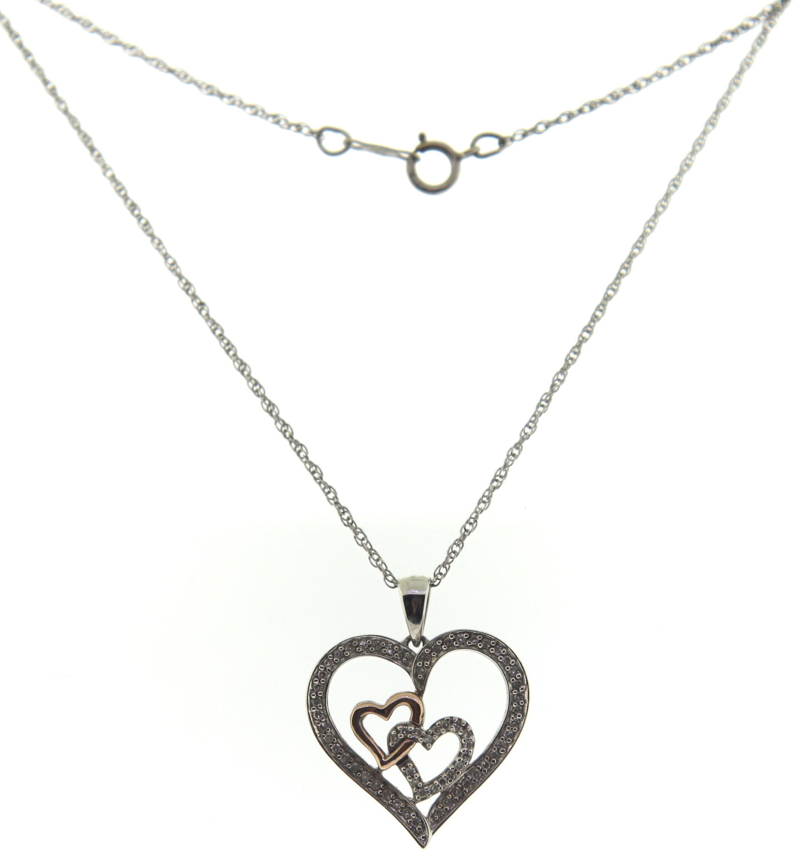 925 Sterling Silver Heart Shaped Pendant on Chain: 925 Sterling Silver Heart Shaped Pendant on 18" Rope Chain Necklace. 3.98 Grams.