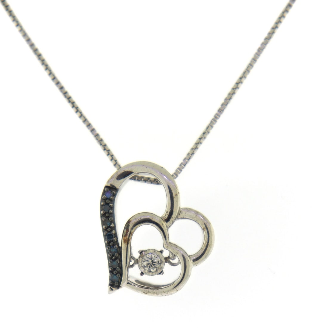 Sterling Silver Heart Shaped Pendant on Chain: Vintage 925 Sterling Silver Heart Shaped Pendant on 18" Box Chain Necklace. The total weight of the necklace is?3.90 Grams.