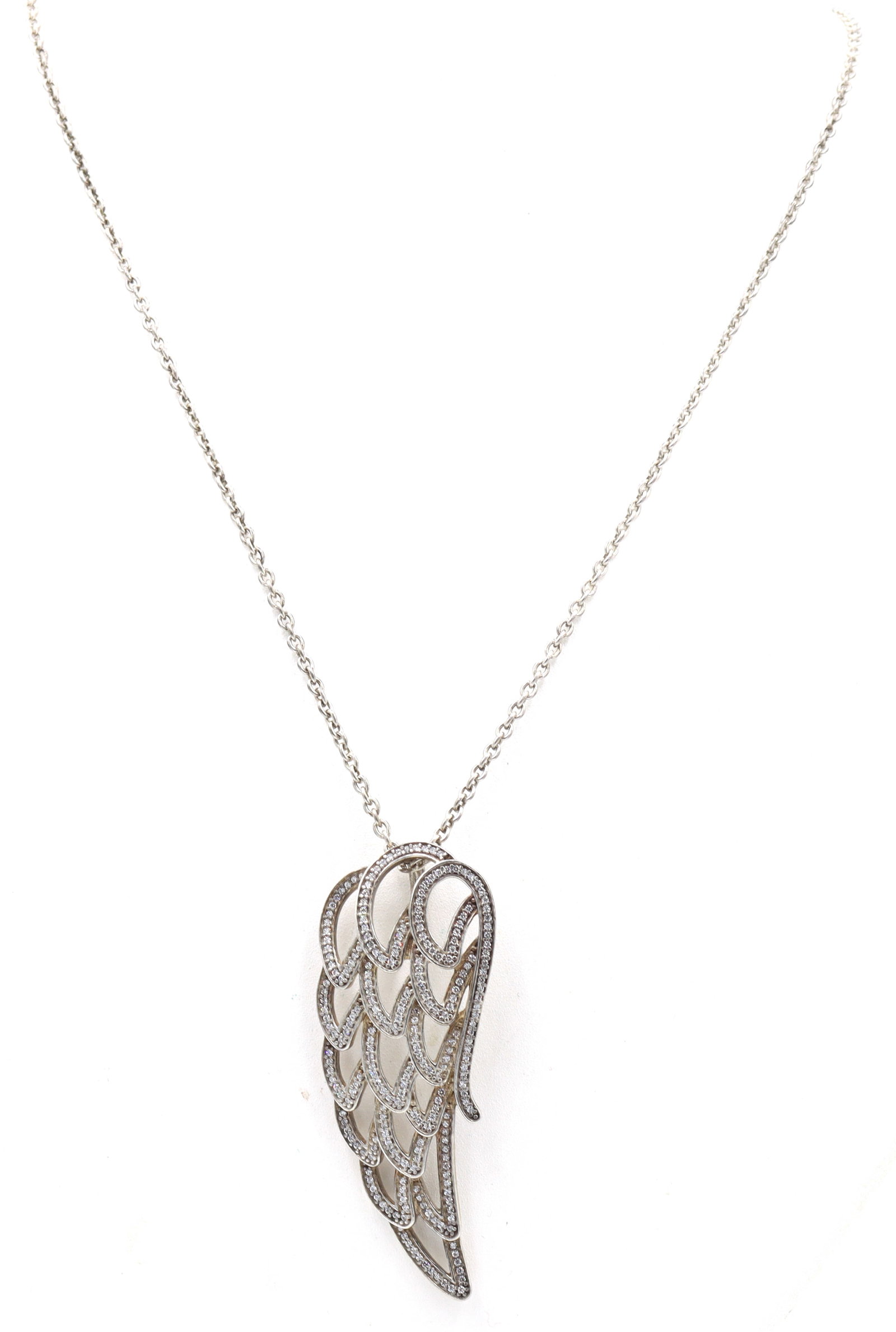 Vintage 925 sterling silver Wing cubic zirconia pendant on chain: Vintage 925 sterling silver Wing cubic zirconia pendant on adjustable 15-34 inches chain necklace. Total weight of necklace is 13.9 grams.