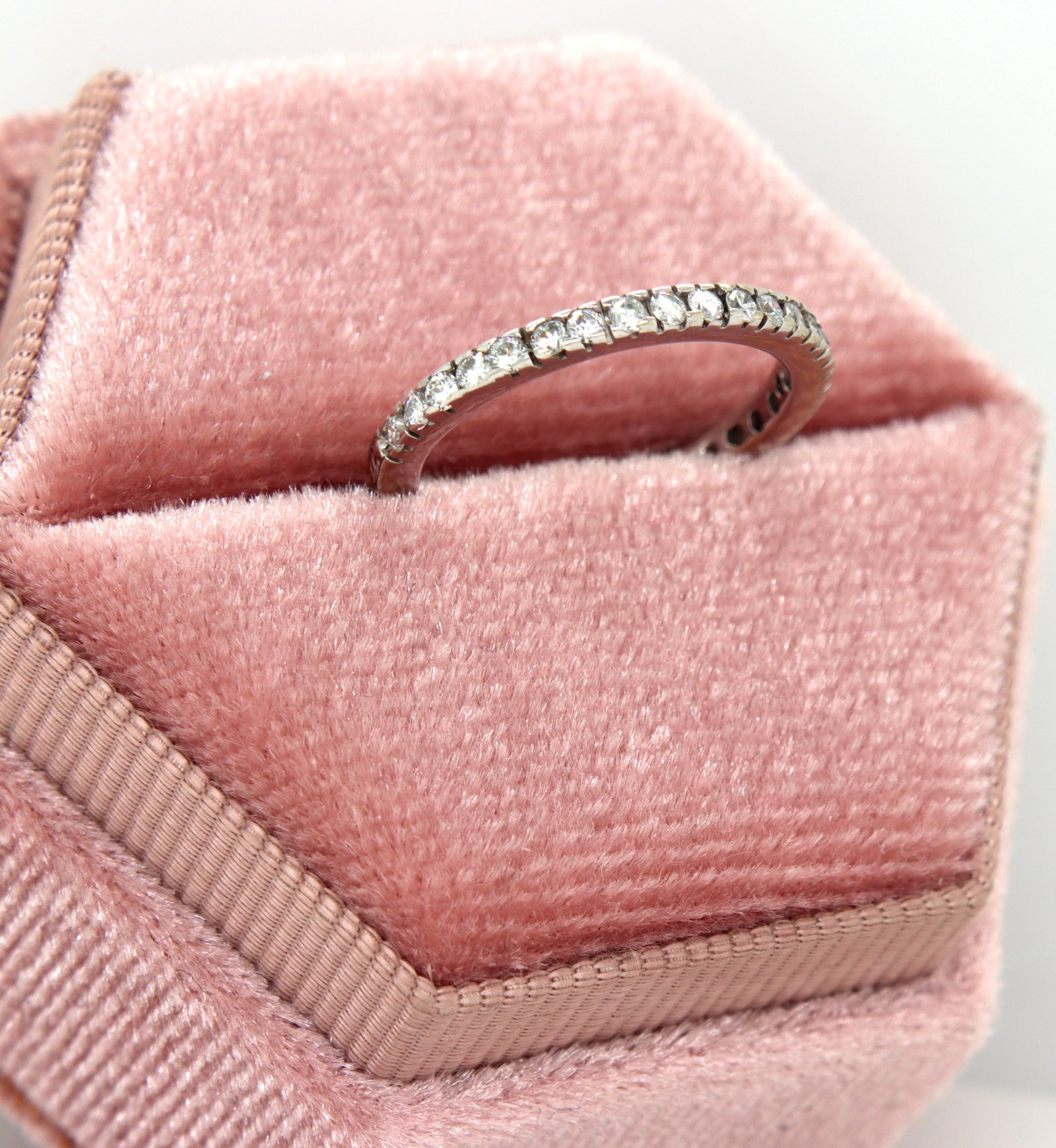 18kt White gold 0.35ctw round brilliant cut twisted rope wedding band: 18kt White gold approximate 0.35ctw round brilliant cut twisted rope wedding band. The total weight of the band is 2.10 grams. Ring size 5".
