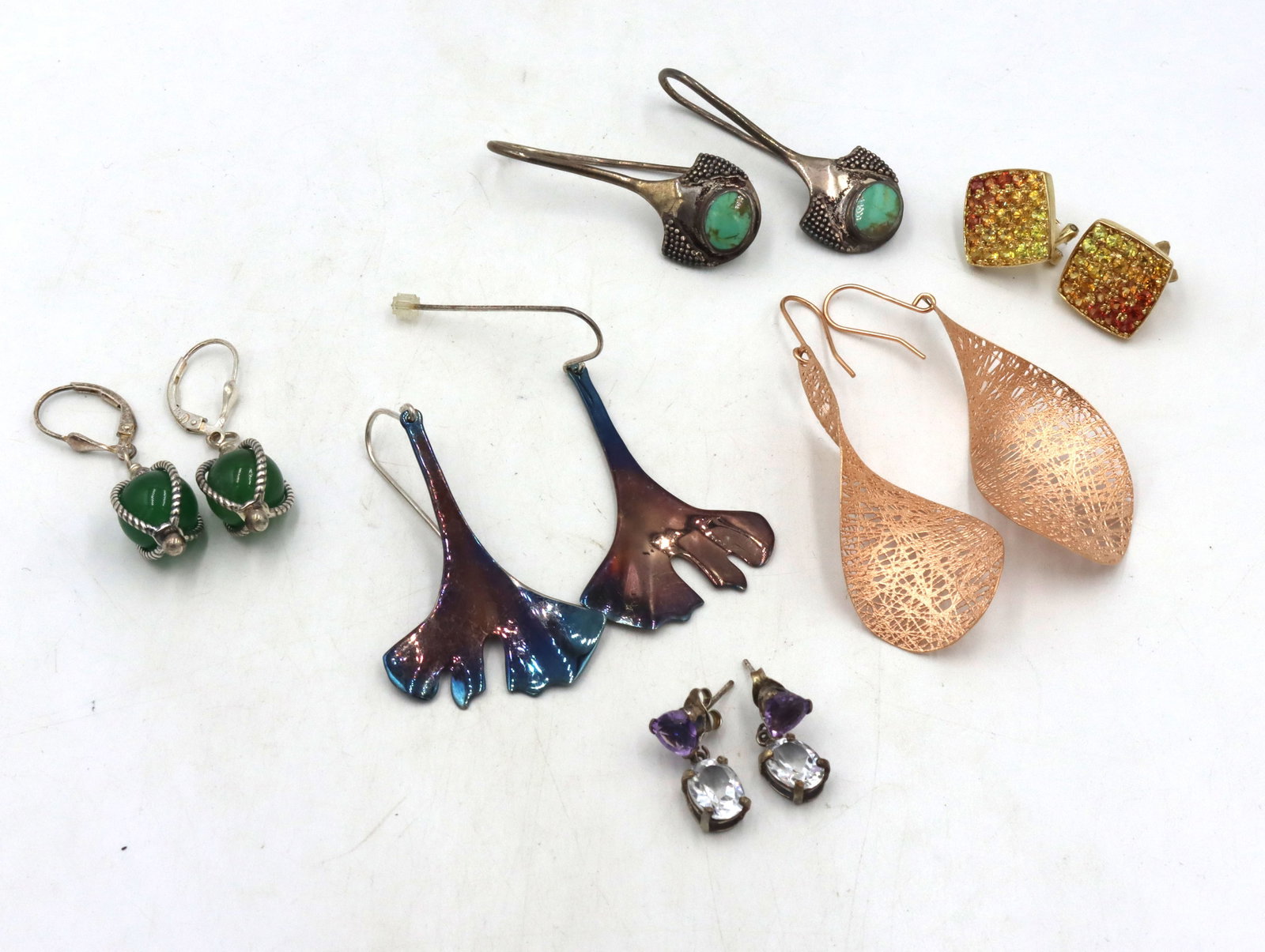 6 Pairs of 925 sterling silver earrings: 6 Pairs of 925 sterling silver earrings. The total weight of the lot is 29.2 grams.