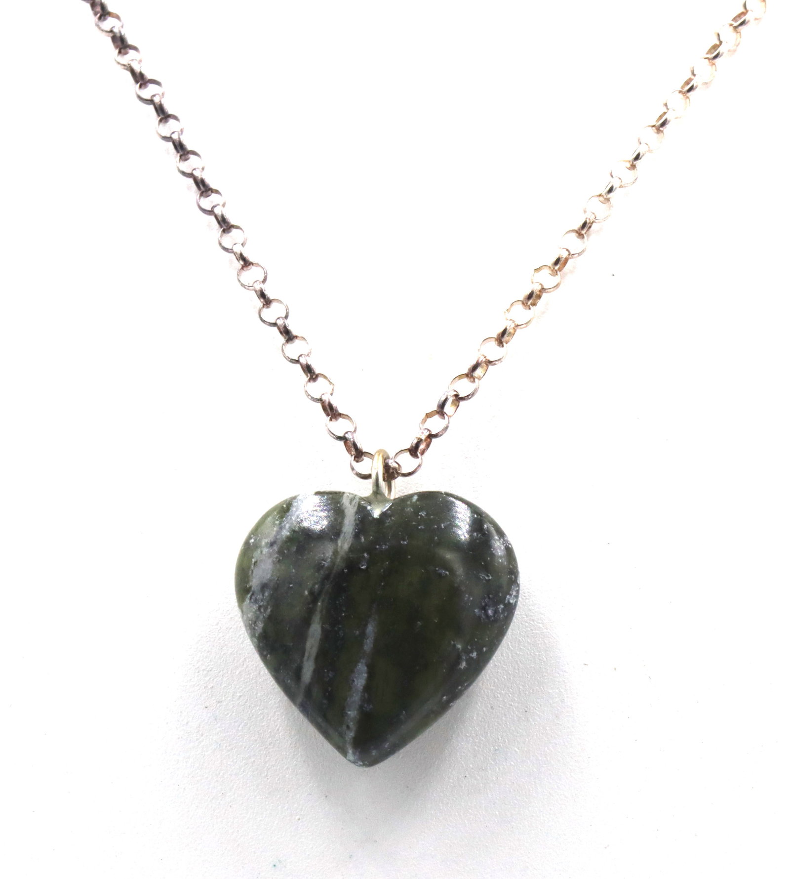 925 Sterling silver heart shaped gemstone pendant on chain: 925 Sterling silver heart shaped gemstone pendant on 18-inch chain necklace. The total weight of the necklace is 7.2 grams.