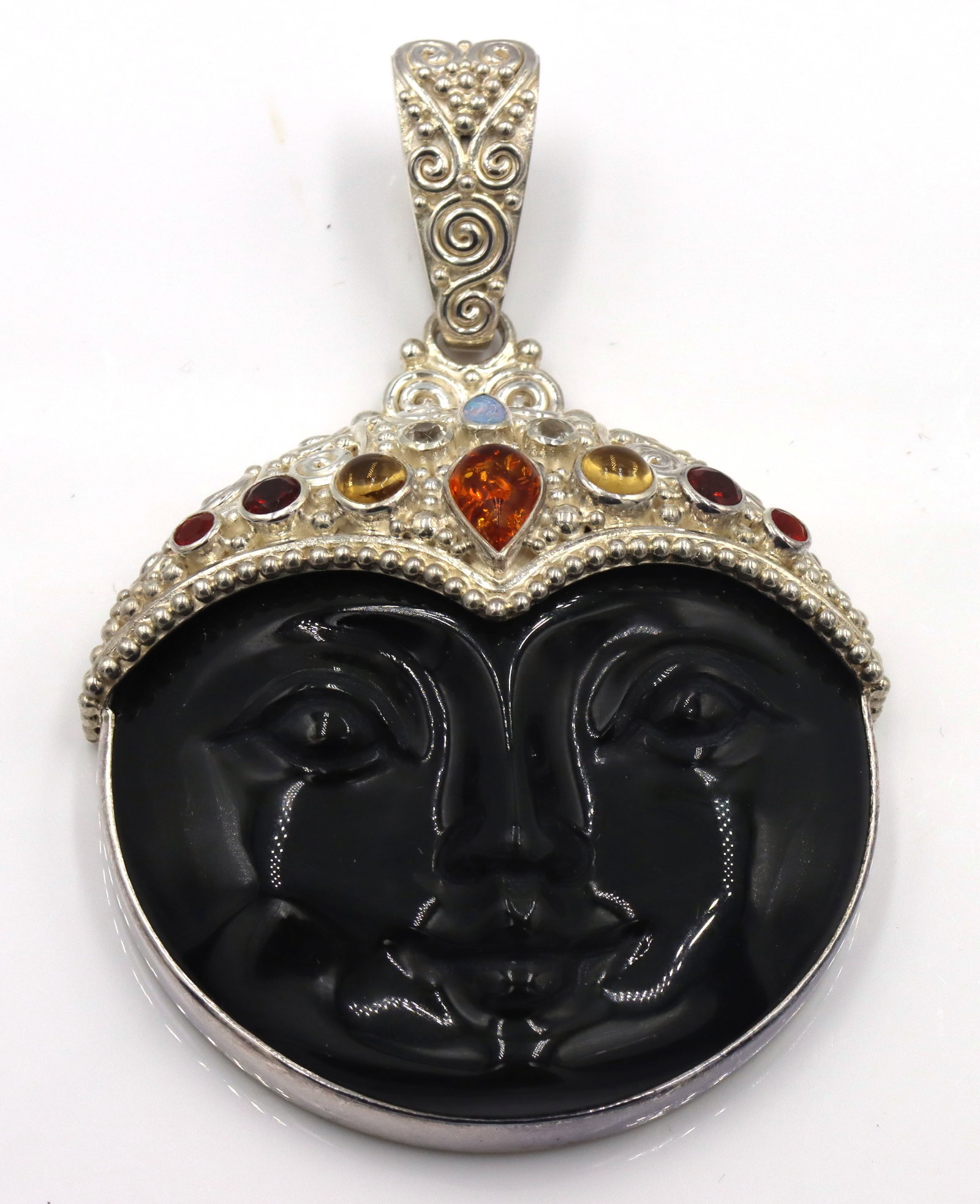 925 Sterling Silver Sejan goddess pendant: 925 Sterling Silver Sejan goddess black onyx pendant. The total weight of the pendant is 62.9 grams.